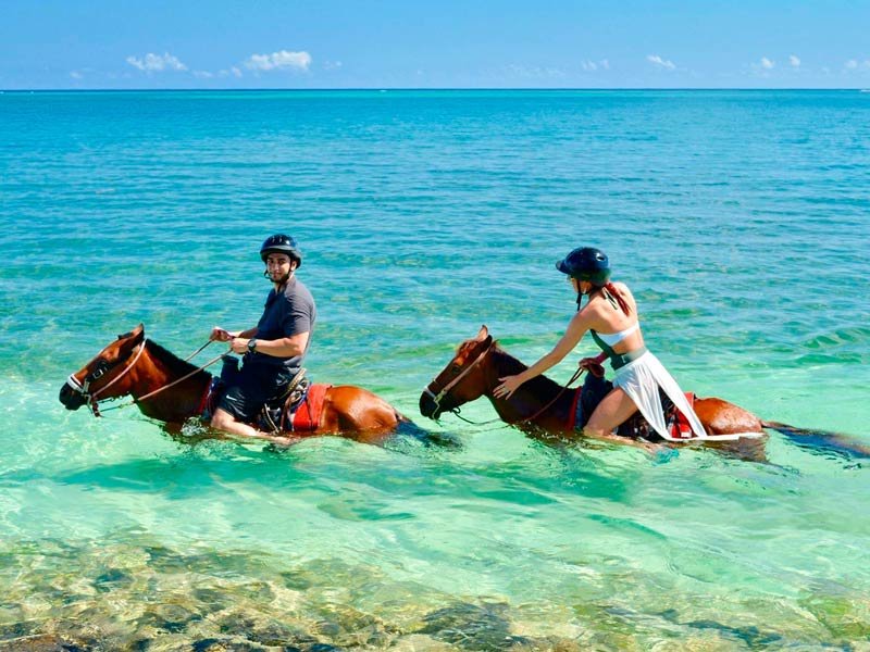 Horseback riding in the sea